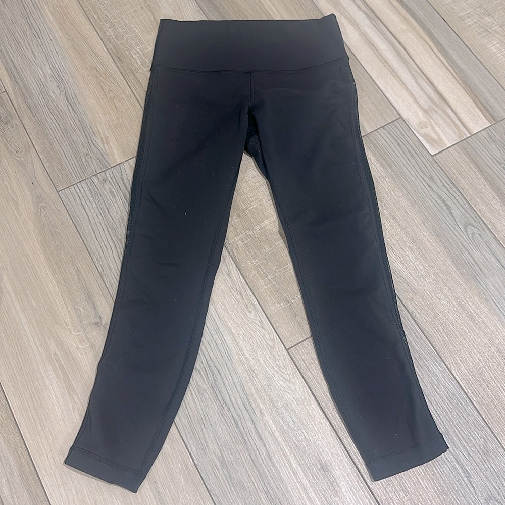 Lululemon yoga pants with mesh down sides of legs